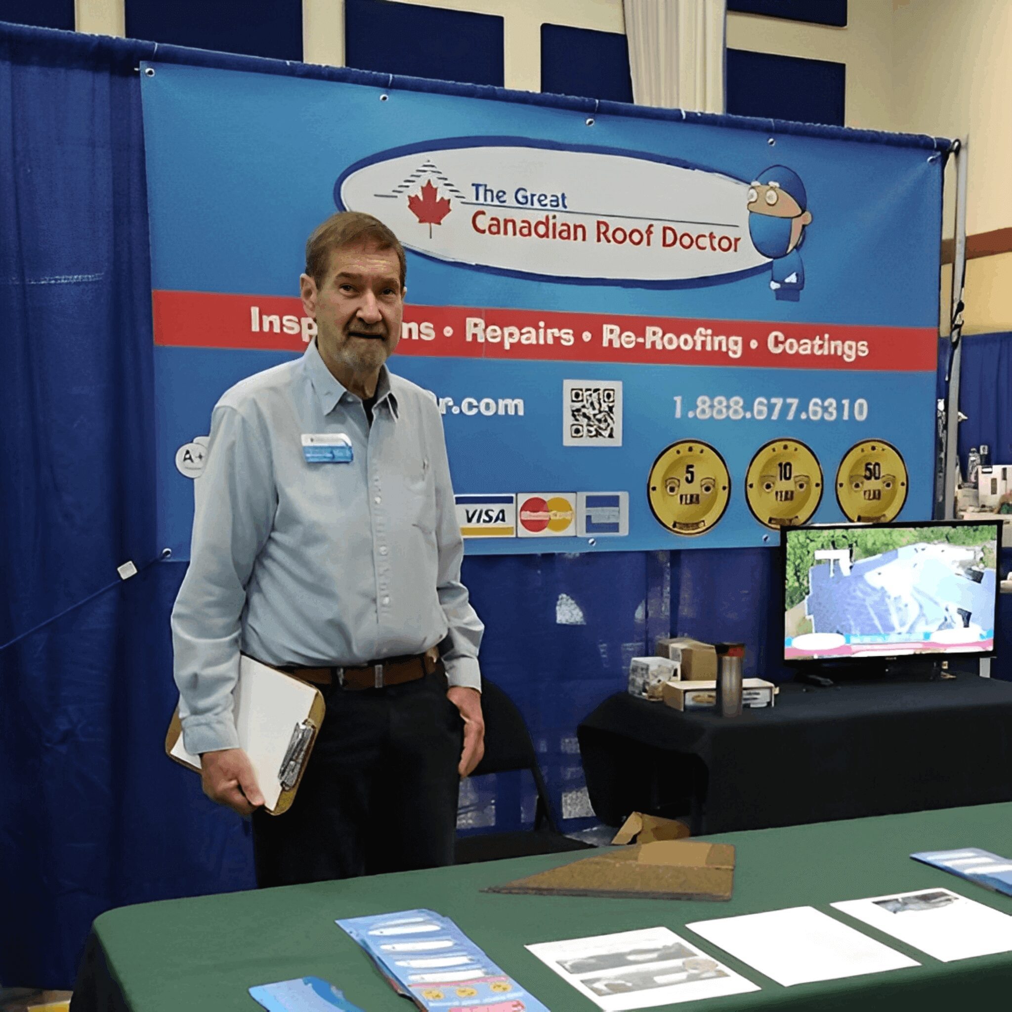 Man standing at a roofing service booth.